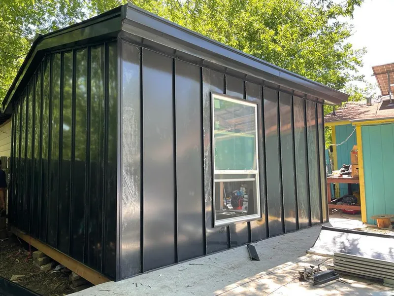 Black standing seam metal wall panels for Metal Roof Installation in Byram