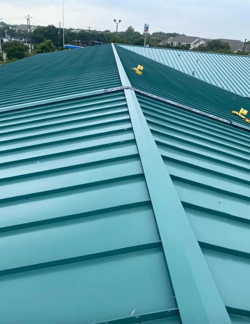 Green commercial metal roof ridge and valley for Metal Roof Repair in Byram